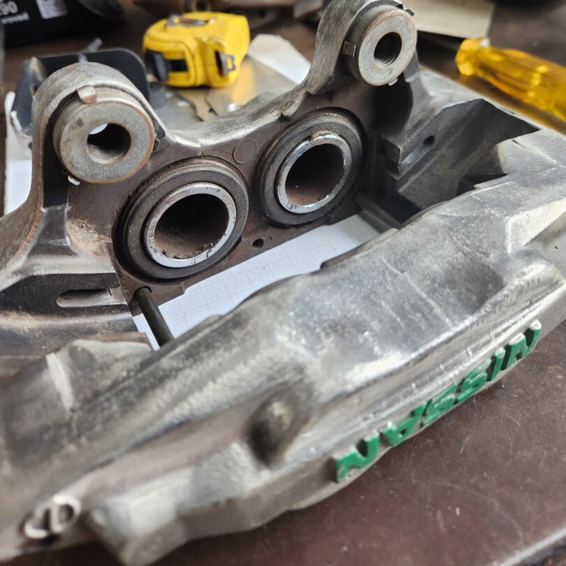 nissan caliper dust boots